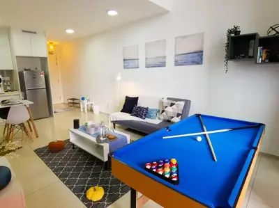 a living room with a blue clock in the middle of it at EkoCheras Loft 5 pax, #Snooker #AboveMall #Balcony #FreeCarPark in Kuala Lumpur