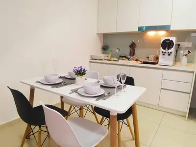 a white table and chairs in a kitchen at EkoCheras Loft 5 pax, #Snooker #AboveMall #Balcony #FreeCarPark in Kuala Lumpur