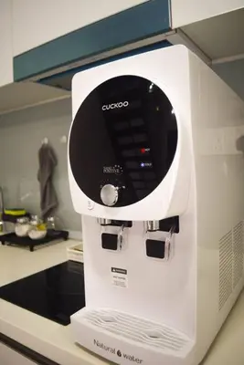 a white coffee maker sitting on top of a microwave at EkoCheras Loft 5 pax, #Snooker #AboveMall #Balcony #FreeCarPark in Kuala Lumpur