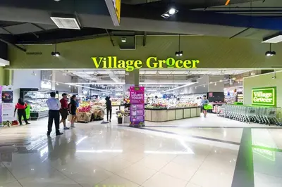a group of people walking through a grocery store at EkoCheras Loft 5 pax, #Snooker #AboveMall #Balcony #FreeCarPark in Kuala Lumpur