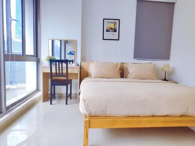 a bedroom with a bed and a desk with a chair at Bintang Fairlane 2mins PavilionKL TRX KLCC - AJhome in Kuala Lumpur