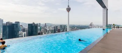 a infinity pool on the top of a skyscraper at Maxhome Plus @ The Platinum KLCC in Kuala Lumpur
