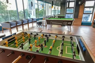 a pool table in a room with a billiards at S20- Bedroom Bukit Bintang Robertson with Netflix in Kuala Lumpur