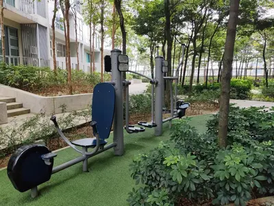 a row of exercise equipment in a park at The Robertson S22 Jalan Alor Petaling Street Bukit Bintang KL 3R2B 8Pax in Kuala Lumpur