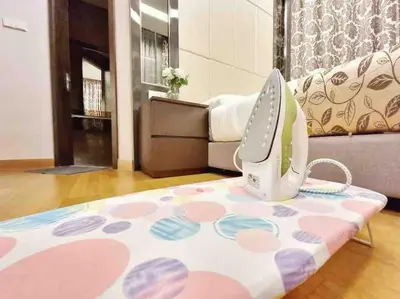 a sewing machine sitting on a table in a room at Dorsett Residence Kuala Lumpur 14 in Kuala Lumpur