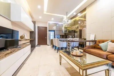 a living room with a couch and a table at Dorsett residence Kuala Lumpur 19 in Kuala Lumpur