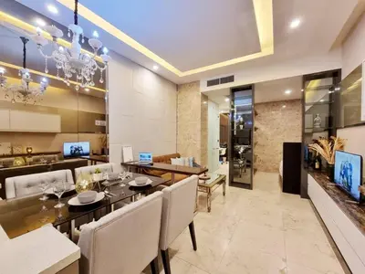 a dining room with a table and chairs at Dorsett residence Kuala Lumpur 19 in Kuala Lumpur