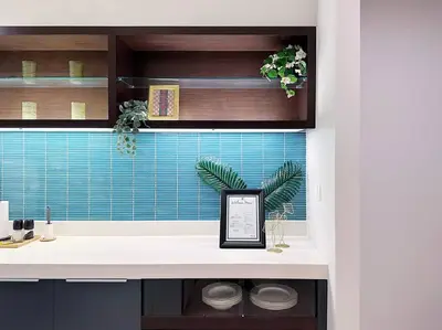 a kitchen counter with a sink and blue tile at Tropicana The Residence Onebedroom suite by VVHOMESTAY in Kuala Lumpur