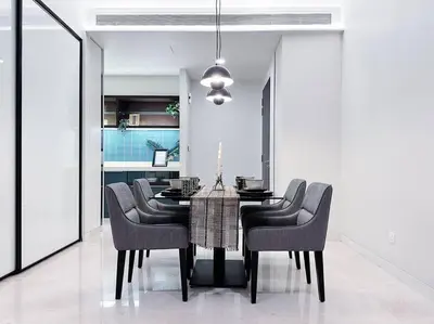 a dining room with a table and chairs at Tropicana The Residence Onebedroom suite by VVHOMESTAY in Kuala Lumpur