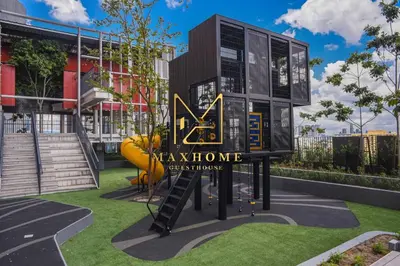 a rendering of a view home sign in front of a building at Maxhome Cozy at Lucentia Bukit Bintang City Centre KL in Kuala Lumpur