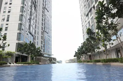 an empty street in a city with tall buildings at MyCrib13*The Robertson KL - Bukit Bintang Pavilion in Kuala Lumpur