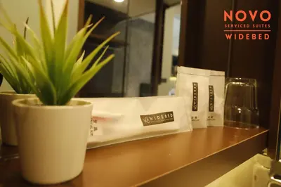 a potted plant sitting on a counter in a bathroom at NOVO Serviced Suites by Widebed, Jalan Ampang, Gleneagles in Kuala Lumpur