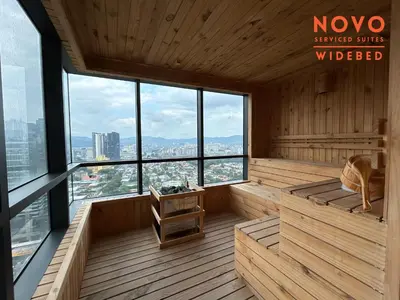 a sauna with a view of a city at NOVO Serviced Suites by Widebed, Jalan Ampang, Gleneagles in Kuala Lumpur