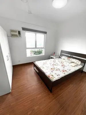 a bedroom with a large bed in a room at Superb Maya Twin Tower View in Kuala Lumpur