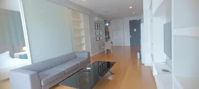 a living room with a couch and a table at Sidemen Suites at Platinum KLCC in Kuala Lumpur
