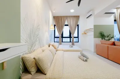 a bedroom with two beds with pillows on them at The Pano Residence Jalan Ipoh Insta-worthy Bath Tub Studio \u6d74\u7f38MRT in Kuala Lumpur