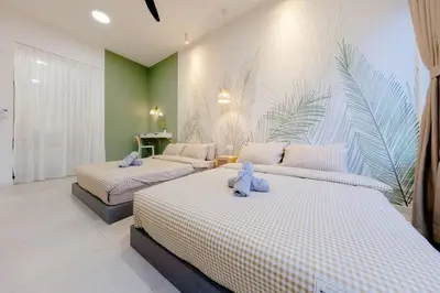 a bedroom with two beds with teddy bears on them at The Pano Residence Jalan Ipoh Insta-worthy Bath Tub Studio \u6d74\u7f38MRT in Kuala Lumpur