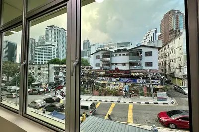 a view of a city street from a window at Hotel MSP Bukit Bintang in Kuala Lumpur