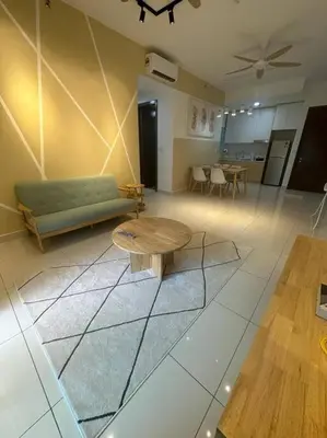 a living room with a couch and a table at Inspirasi Residences Mont Kiara muji house in Kuala Lumpur