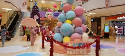 a large pile of balloons in a shopping mall at Plaza Berjaya Apt Bukit Bintang with Pool Table in Kuala Lumpur
