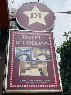 a sign for a hotel llima inn with a star at Hotel Dlima Inn Bukit Bintang in Kuala Lumpur