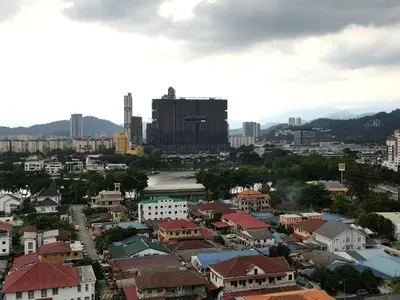 an aerial view of a city with buildings at Ampang Hilir Lake View in Kuala Lumpur