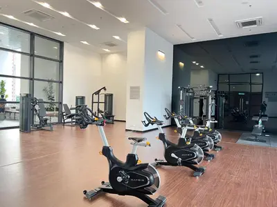 a gym with several treadmills and exercise bikes at Chambers service suites klcc in Kuala Lumpur