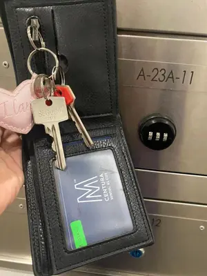 a pair of keys in a wallet next to a toaster at M Centura Sentul in Kuala Lumpur