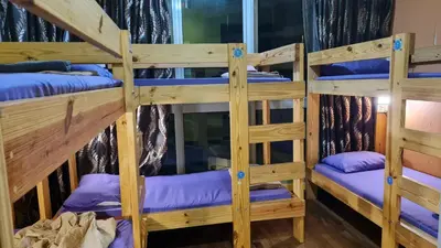 a couple of bunk beds in a room at Hostel At Regalia Sky Pool in Kuala Lumpur