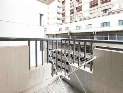 a balcony of a building with a metal railing at Plaza Berjaya By Manhattan Group in Kuala Lumpur
