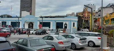a group of cars parked in a parking lot at Plaza Berjaya Apt Bukit Bintang With 3 Bedroom in Kuala Lumpur