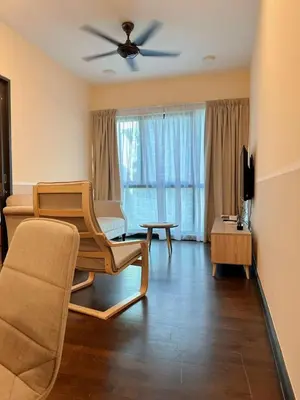 a living room with a couch and a ceiling fan at Sunway Velocity link velo mall Muji-2BR \u4e2d\u6587\u623f\u4e1c in Kuala Lumpur