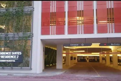 an empty building with a sign in the window at Sunway Velocity Suite link velocity mall in Kuala Lumpur