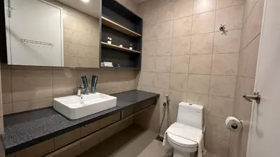 a bathroom with a sink and a toilet at Balcony Unit @ Robertson Residence 18f in Kuala Lumpur