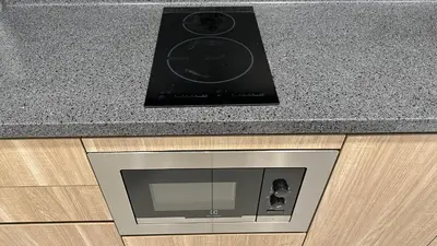 a microwave on top of a counter in a kitchen at Balcony Unit @ Robertson Residence 18f in Kuala Lumpur