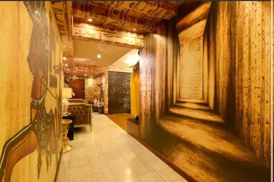 a hallway in a building with wooden ceilings at Fahrenheit88 - Egypt Theme Kuala Lumpur Bukit Bintang in Kuala Lumpur