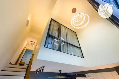 a view from the top of a house with a window at Luxury Duplex Condo Retreat-Corner v 2 Parking, KL by Verano in Kuala Lumpur