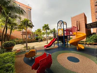 a playground with a slide and a slideintend at APARTMENT by Times Square KL in Kuala Lumpur