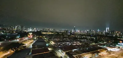 a view of a city at night with lights at The Elements @ Ampang in Kuala Lumpur