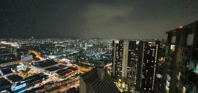 a view of a city at night with buildings at The Elements @ Ampang in Kuala Lumpur
