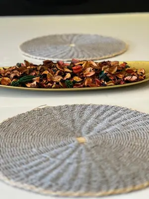 two plates of food sitting on a table at Star residance at Klcc - Two bedrooms with twin towers view in Kuala Lumpur
