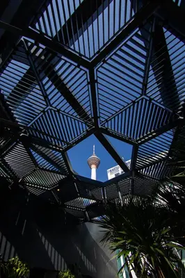a view of the eiffel tower through the roof of a building at Hotel Indigo Kuala Lumpur on the Park by IHG in Kuala Lumpur