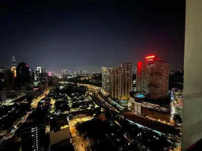 a view of a city at night with buildings at Chambers Residence by FANTASTIC in Kuala Lumpur
