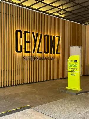 a company sign on the side of a building at Ceylonz Suites KLCC, Bkt Bintang in Kuala Lumpur