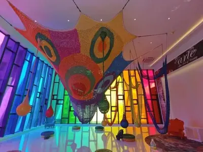 a room with a painting on the ceiling of a building at Arte Mont Kiara in Kuala Lumpur