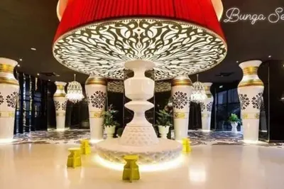 a table with a lamp on top of a table at Arte Mont Kiara in Kuala Lumpur