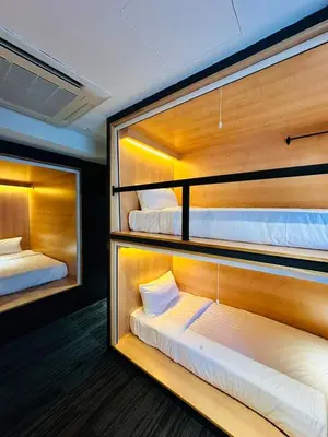 a room with two bunk beds in it at The Bed Bukit Bintang in Kuala Lumpur