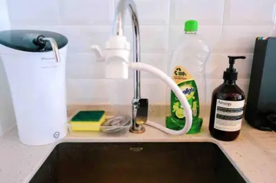 a kitchen sink with a faucet and a sink at Continew Residence Cozy Suite by GUESTONIC in Kuala Lumpur