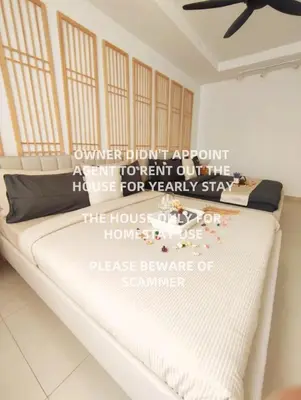 a bedroom with a bed with a sign on it at KLCC Night View Spacious Muji MITEC 3min 121CAE in Kuala Lumpur