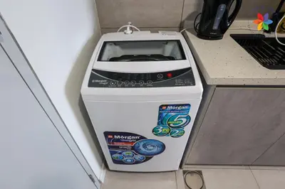 a computer printer sitting on top of a counter at The Pano @ Jalan Ipoh by Lily and Loft in Kuala Lumpur
